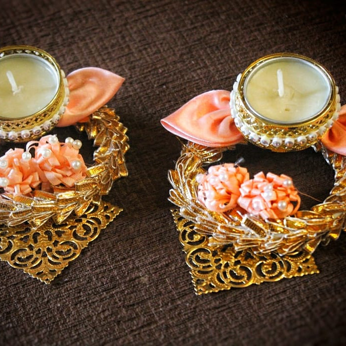 Designer Diya With Artificial Pink Flower Plus Candle Holder