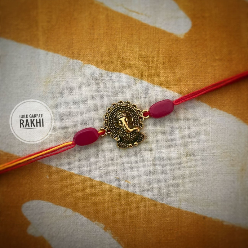 Ganpati ideal rakhi with Pearl Ganpati ideal rakhi with Pearl