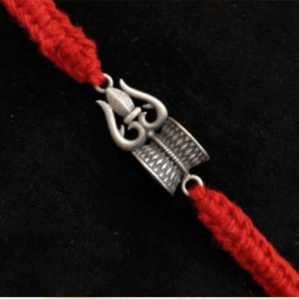 Silver Rakhi Design With Trishul And Damru