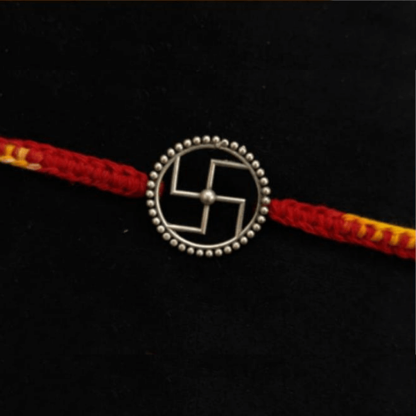 Silver Swastik Rakhi With Outer Circle