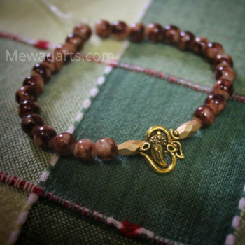 Hand Bracelet With Ganpati Statue Design And Brown Color Beads Hand Bracelet With Ganpati Statue Design And Brown Color Beads